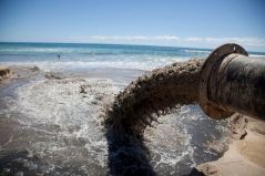 marine-pollution-sewage-pipe-draining-in-ocean-in-la